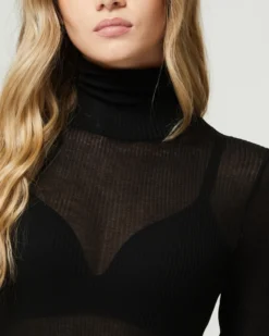 Maglia rib manica lunga collo alto in modal cashmere a costine