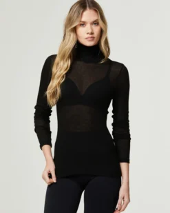 Maglia rib manica lunga collo alto in modal cashmere a costine